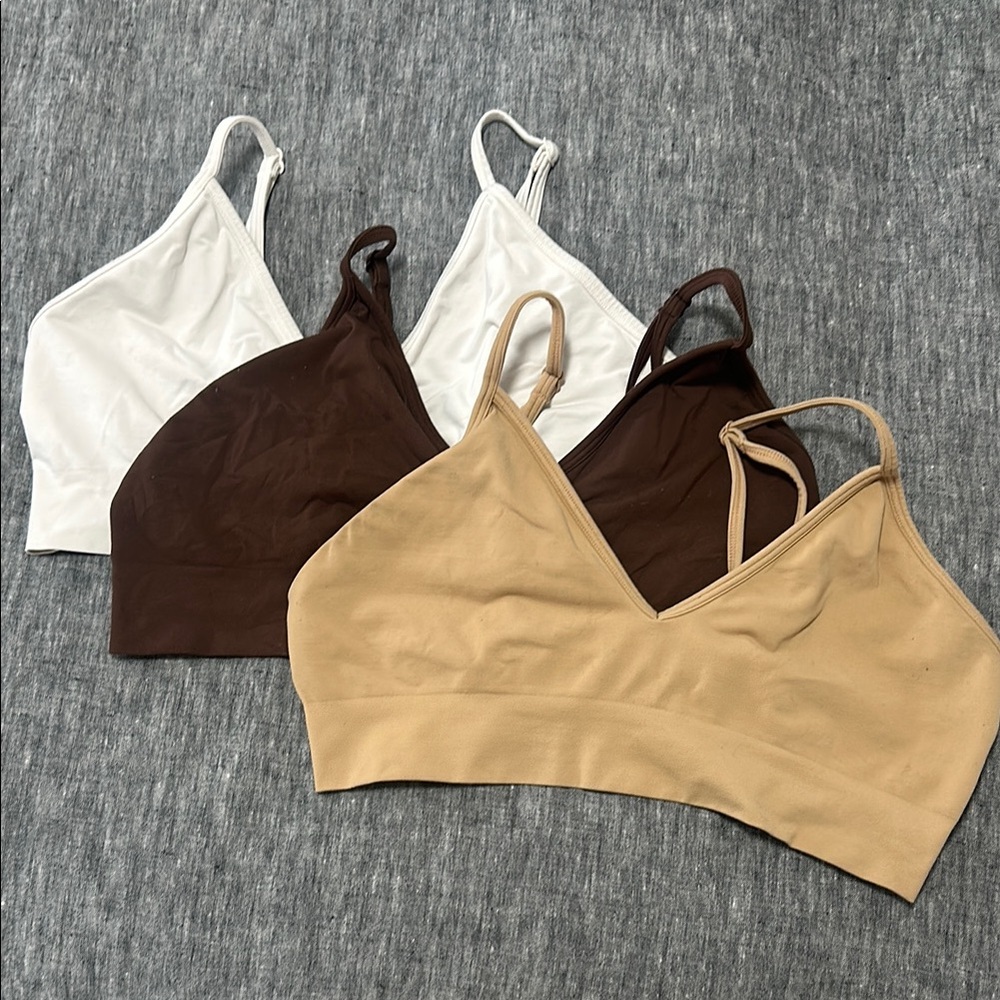 SKIMS bra bundle — tan, white and brown